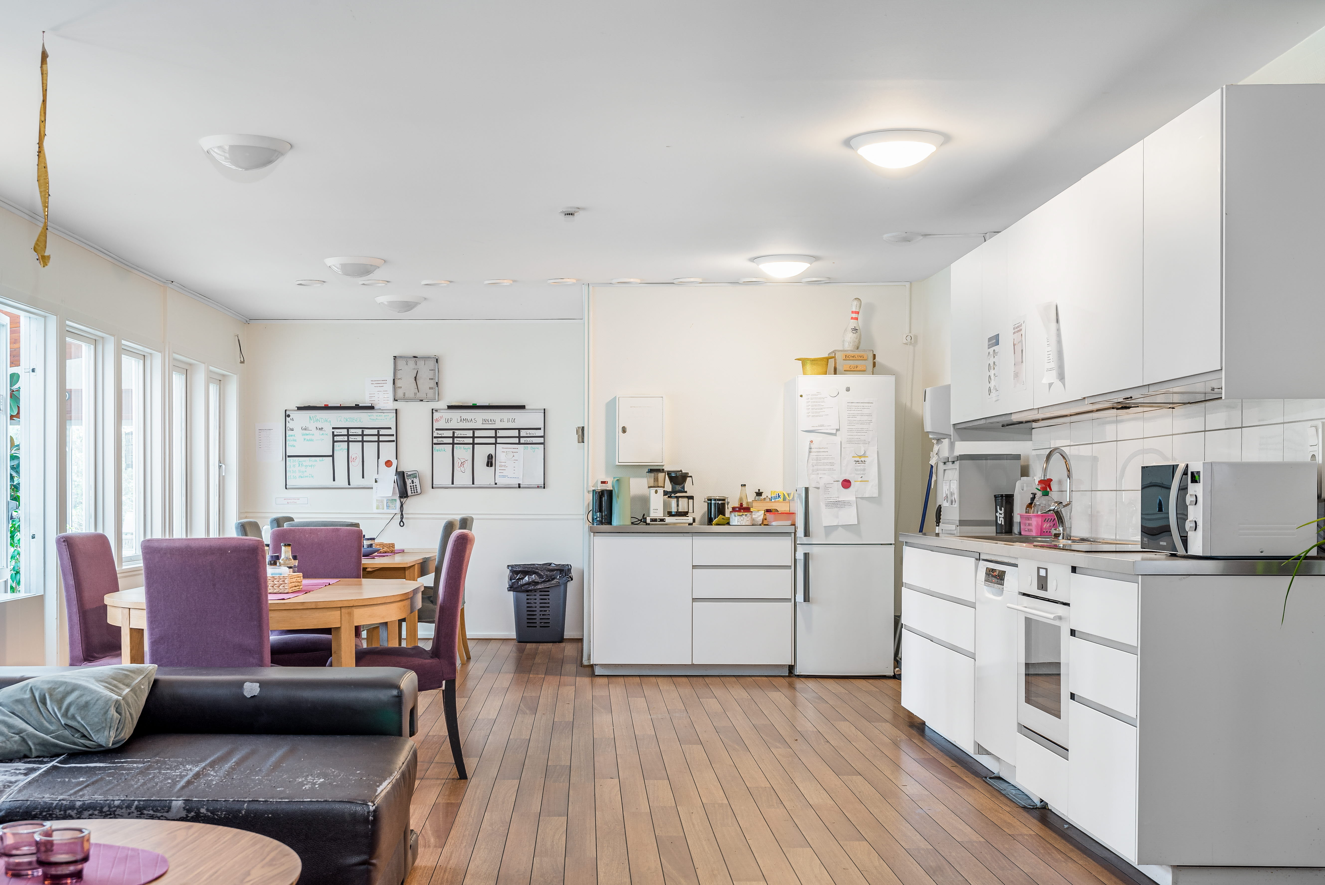 A kitchen filled with lots of furniture