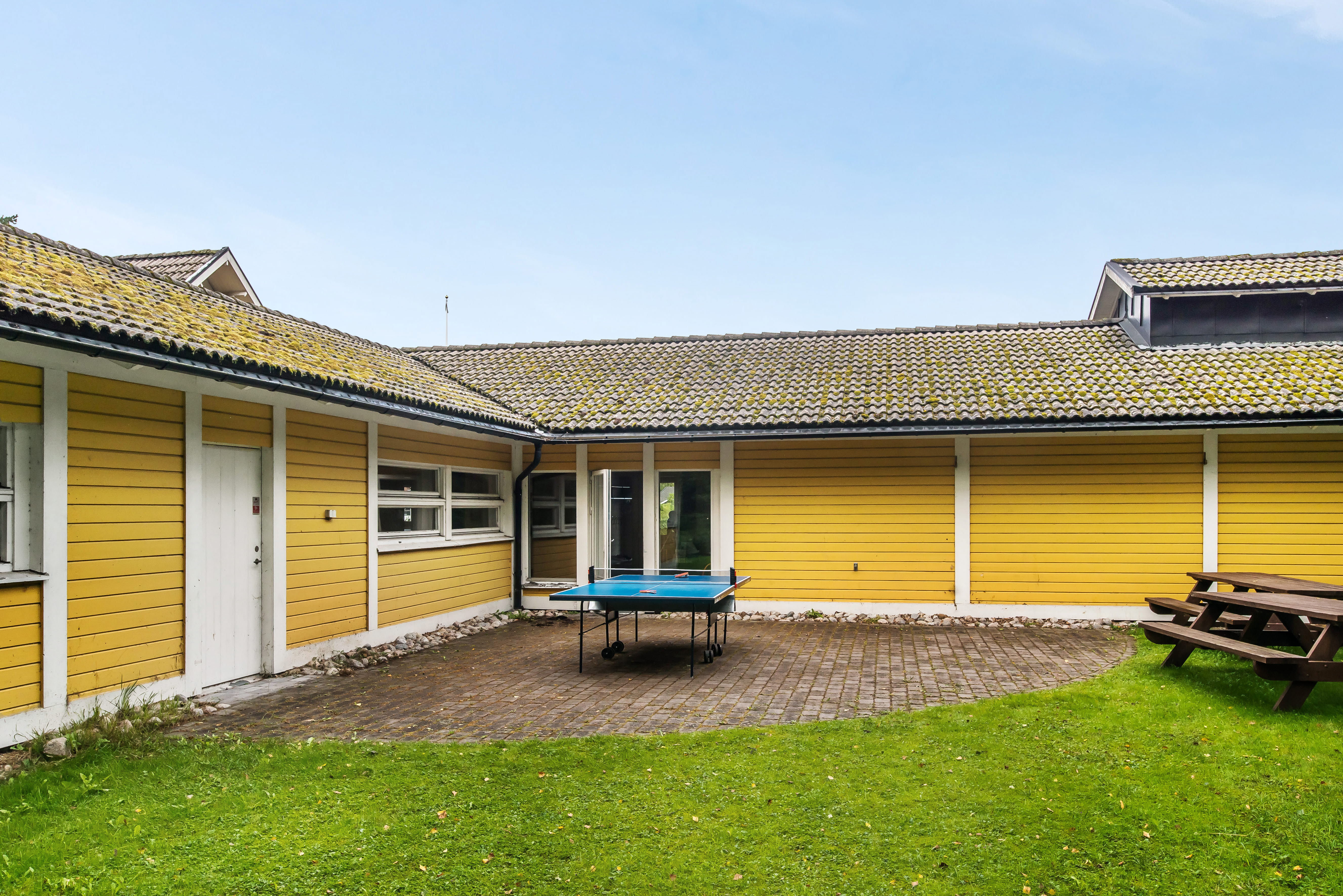 A large lawn in front of a house