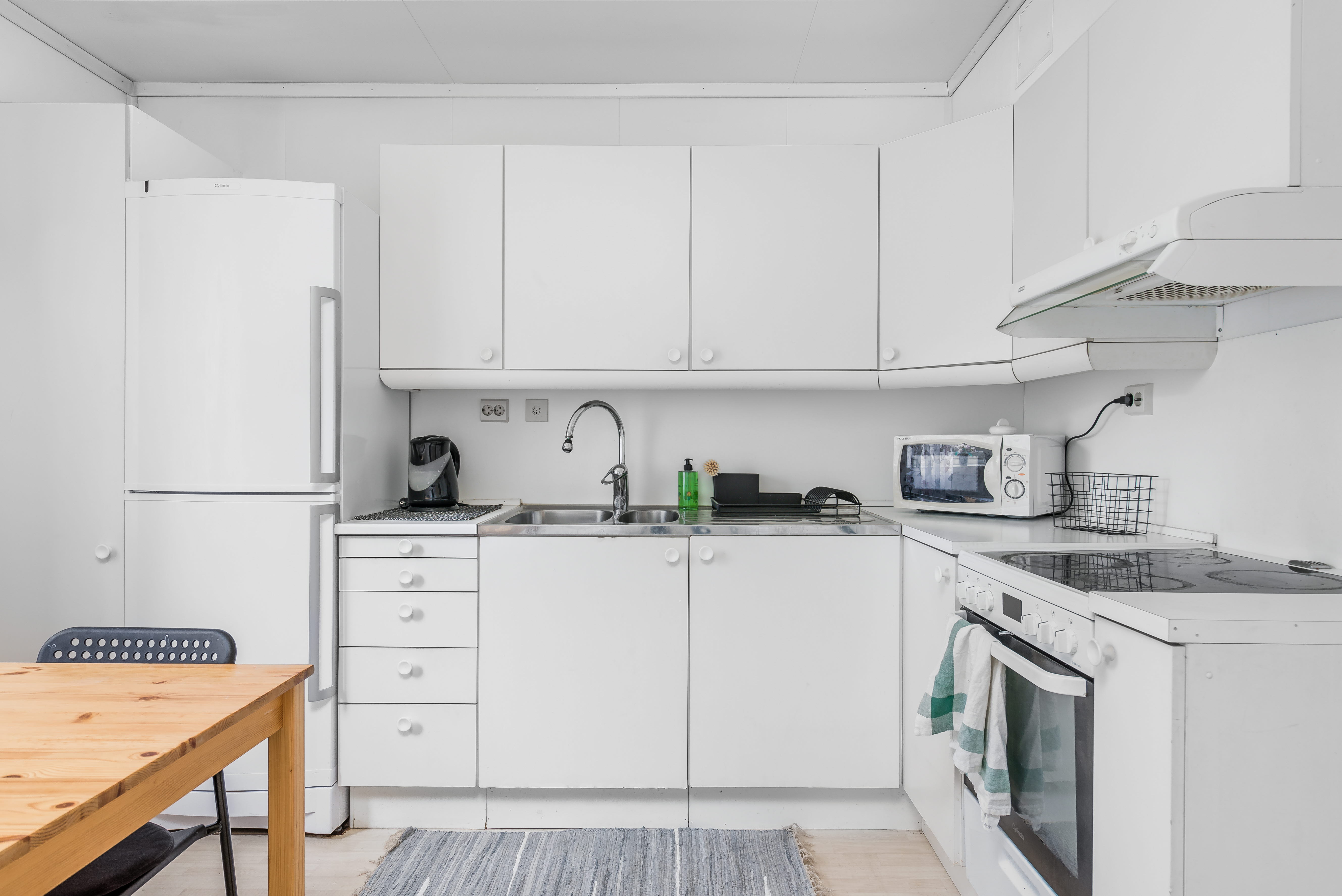 A stove top oven sitting inside of a kitchen