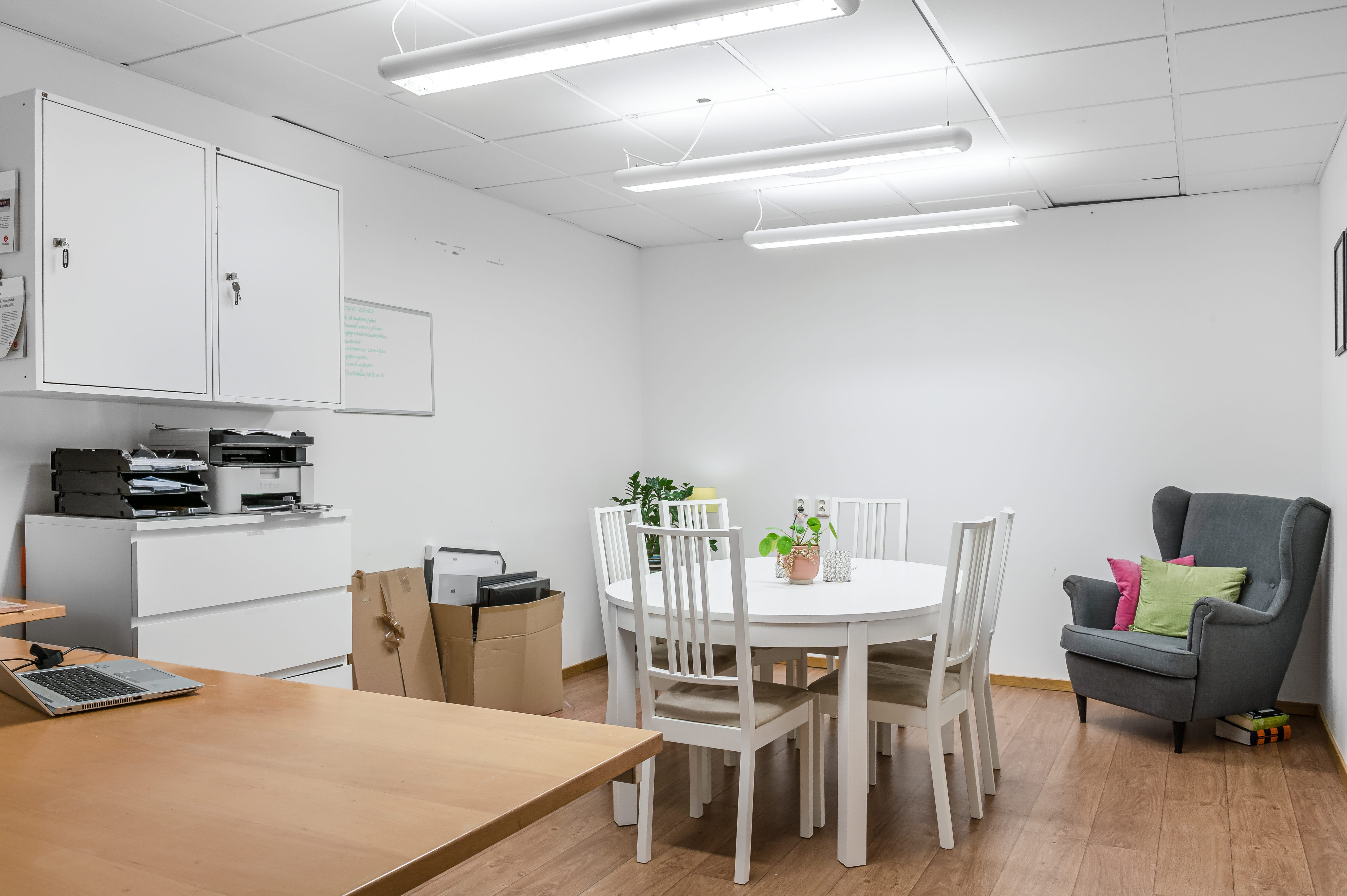 A kitchen with a dining room table