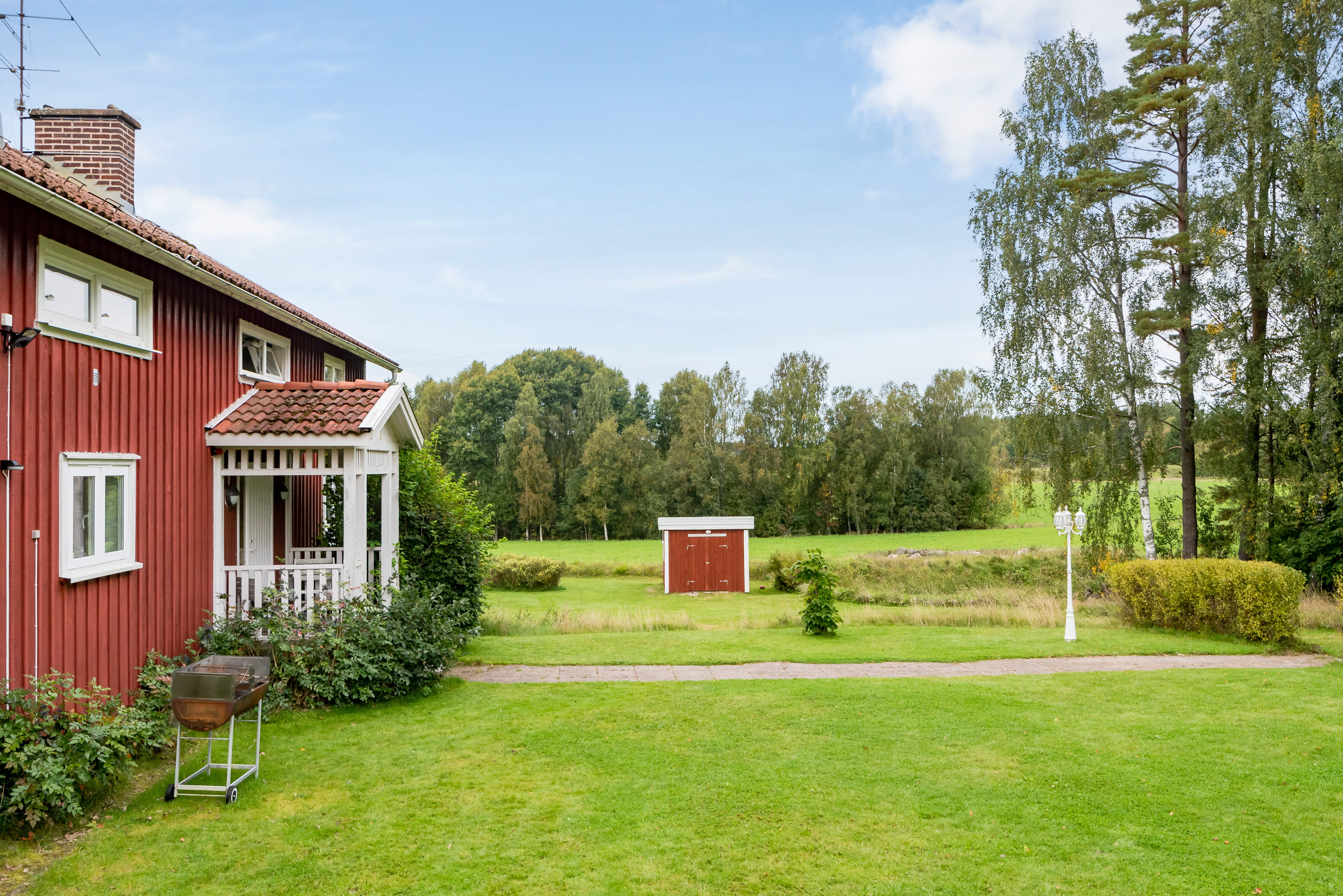 A large lawn in front of a house