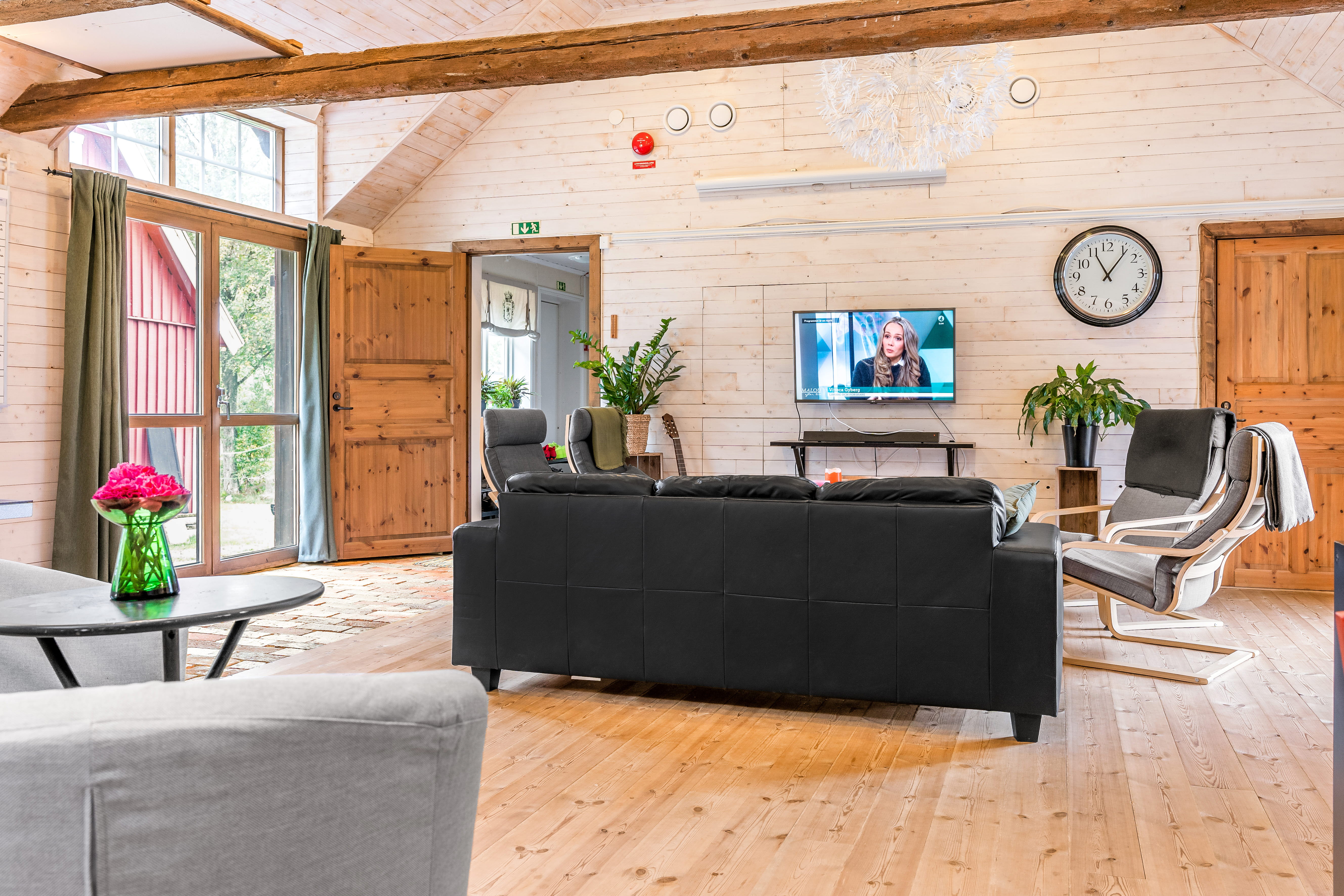 A living room filled with furniture and a fireplace