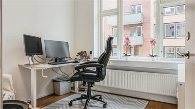 A room with a desk and chair