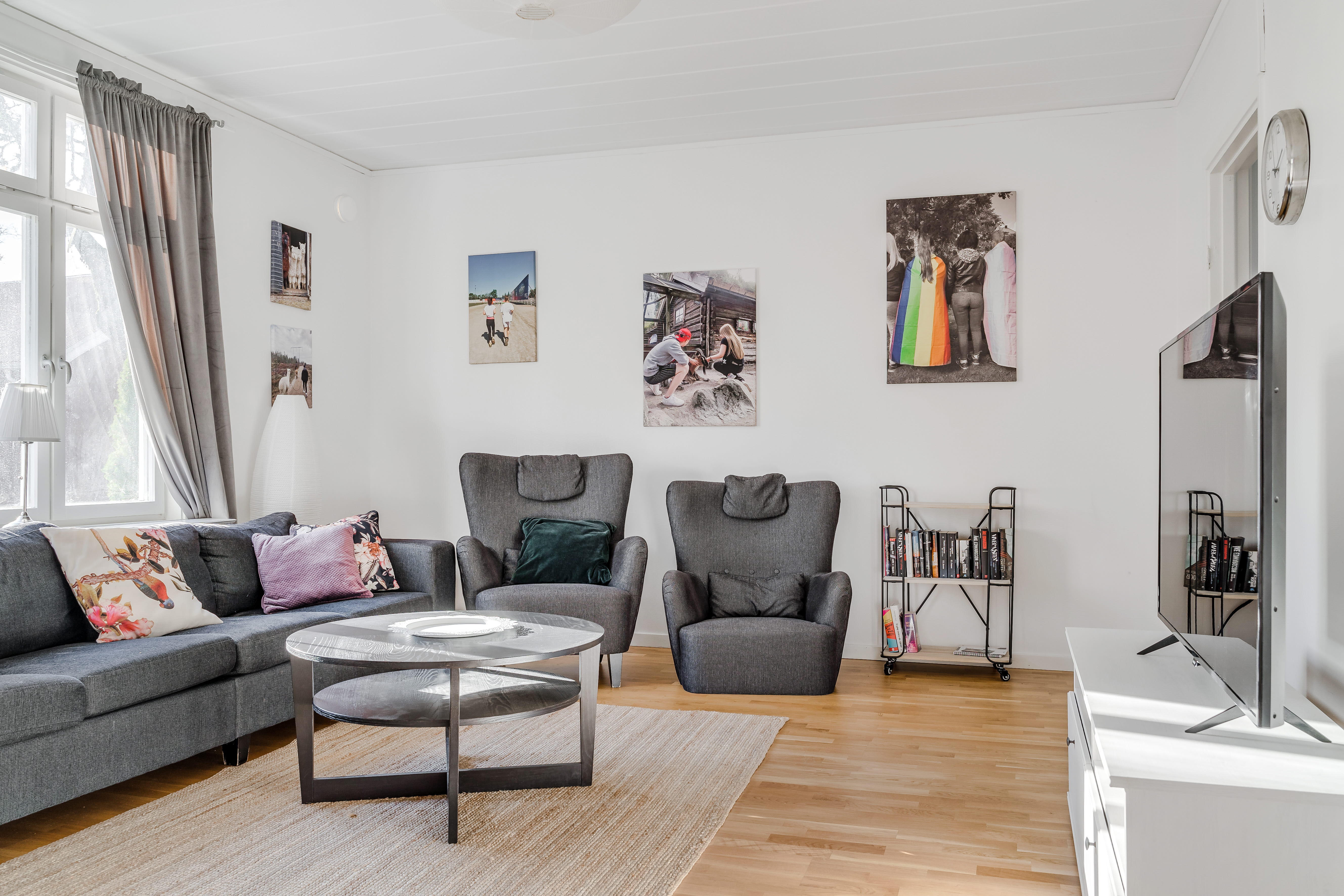 A living room filled with furniture and a fireplace
