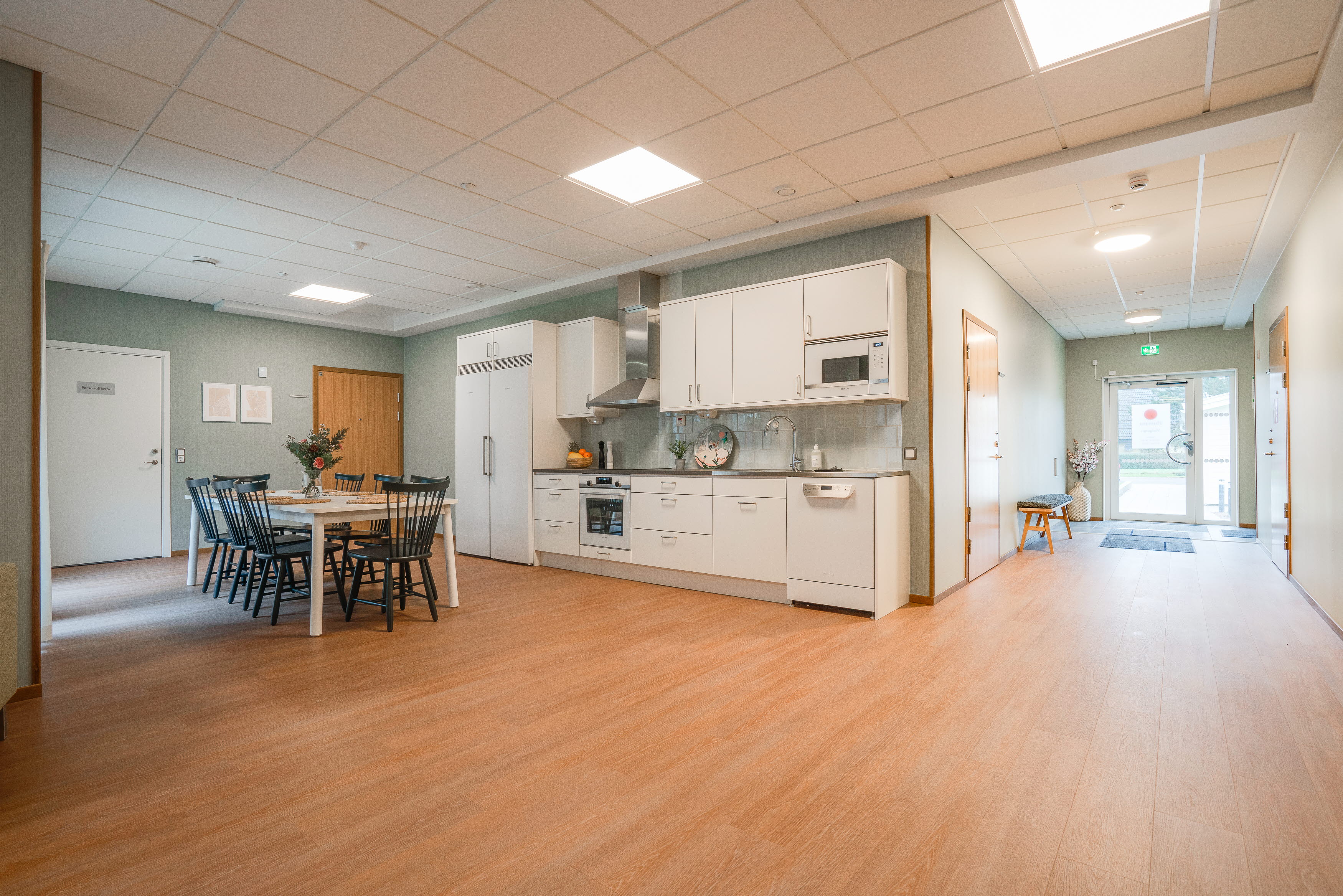 A large empty room with a wood floor
