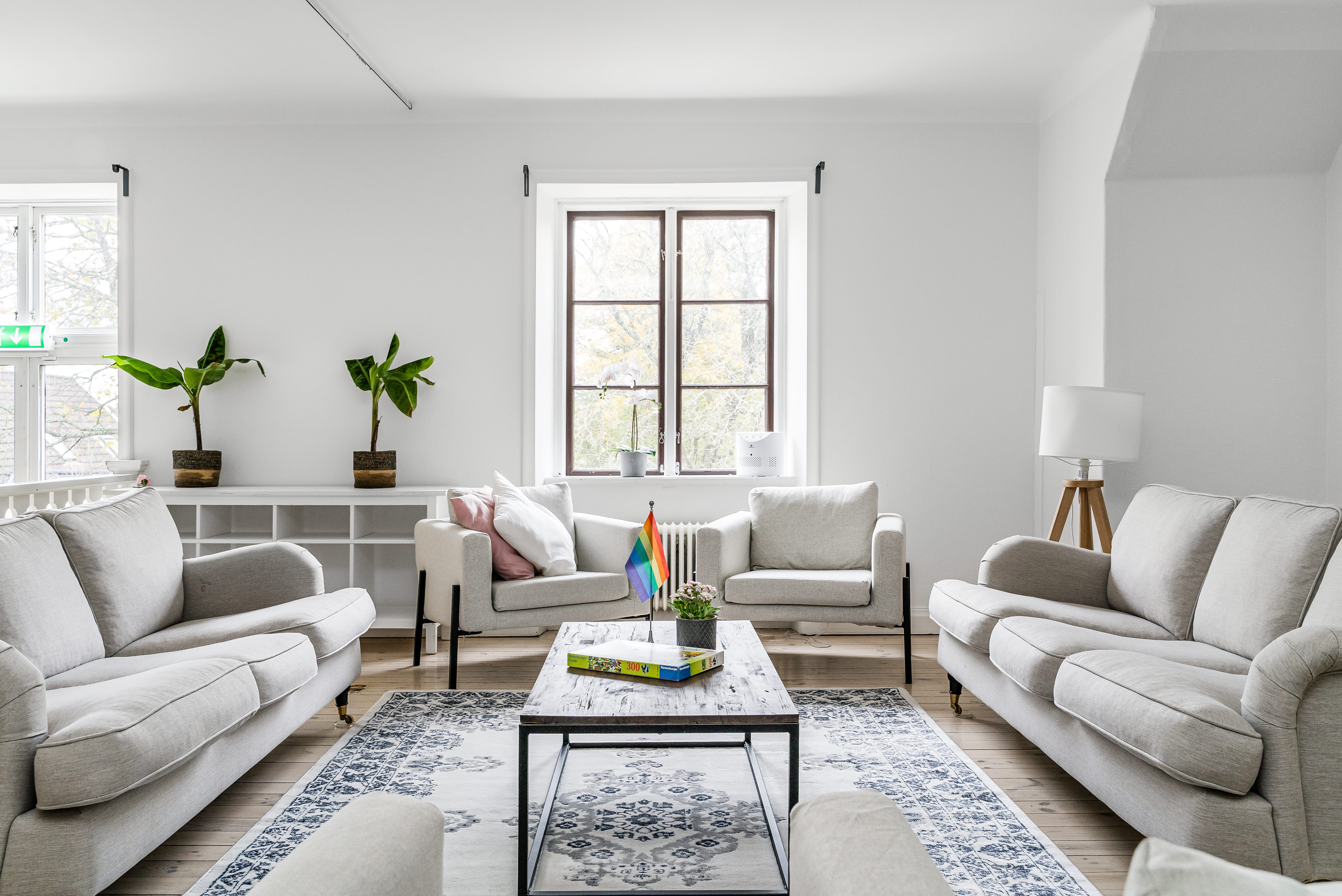 A living room filled with furniture and a flat screen tv
