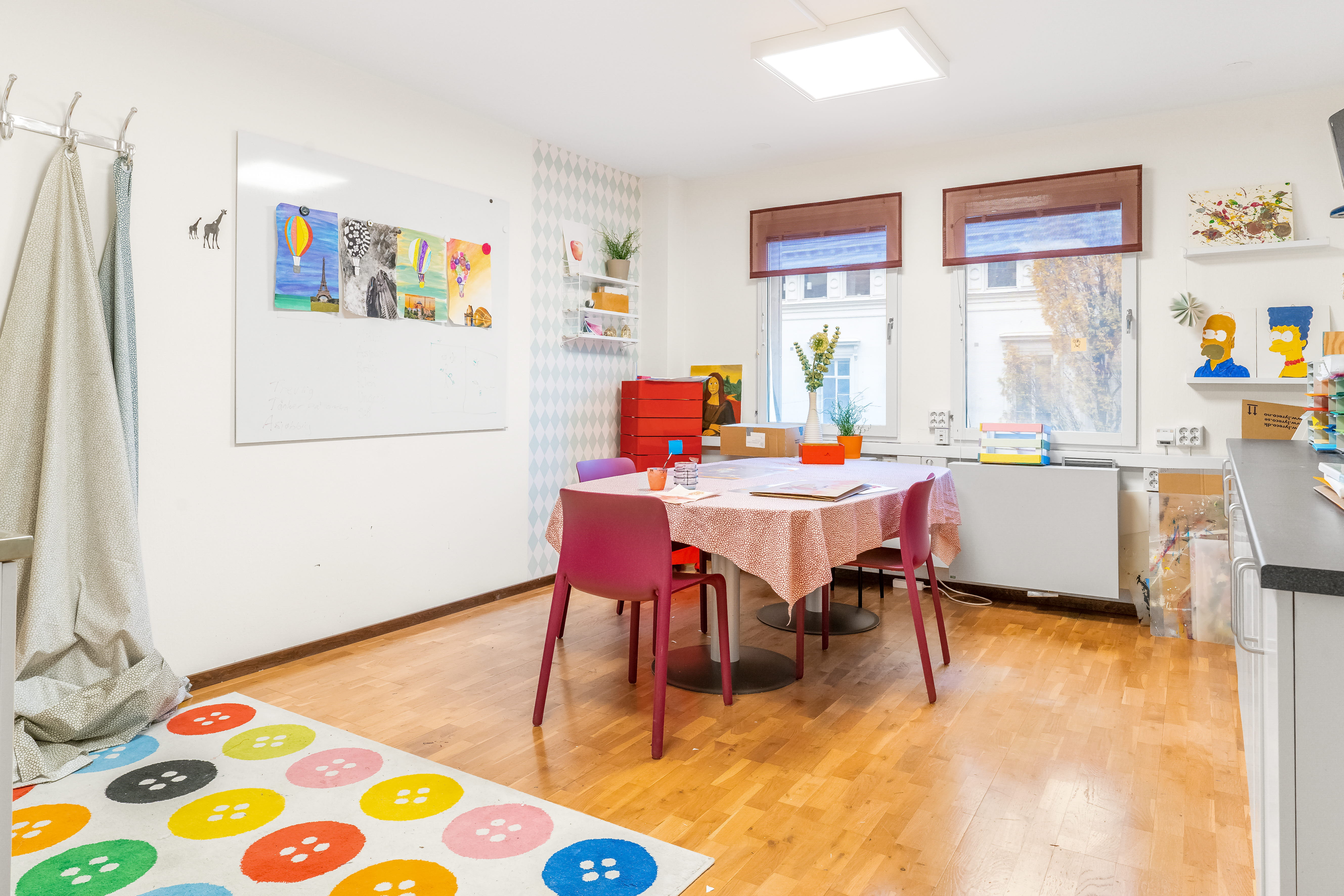A kitchen with a dining room table