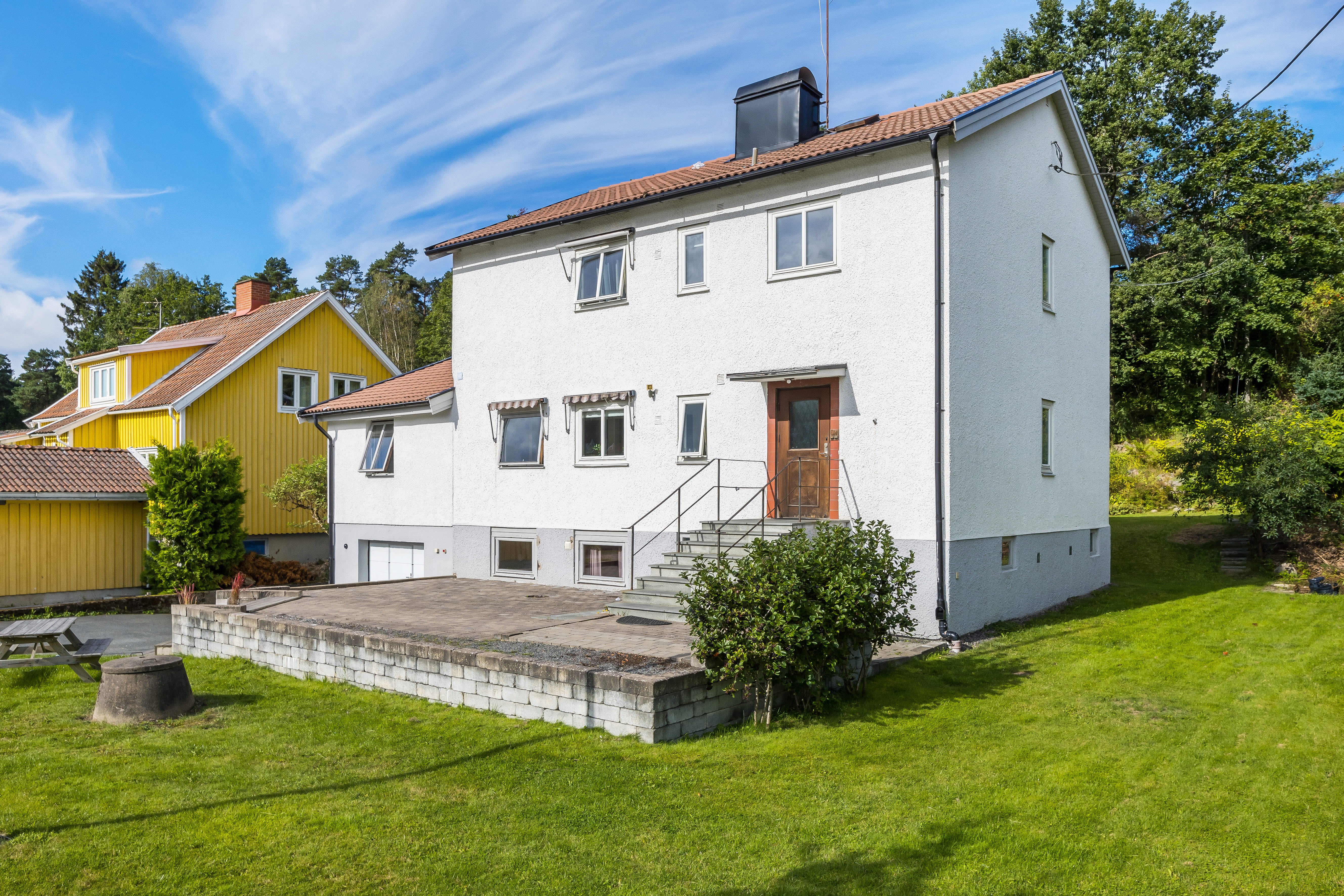 A large lawn in front of a house