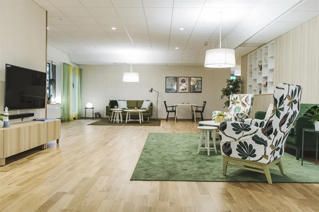 A room filled with furniture and a wood floor
