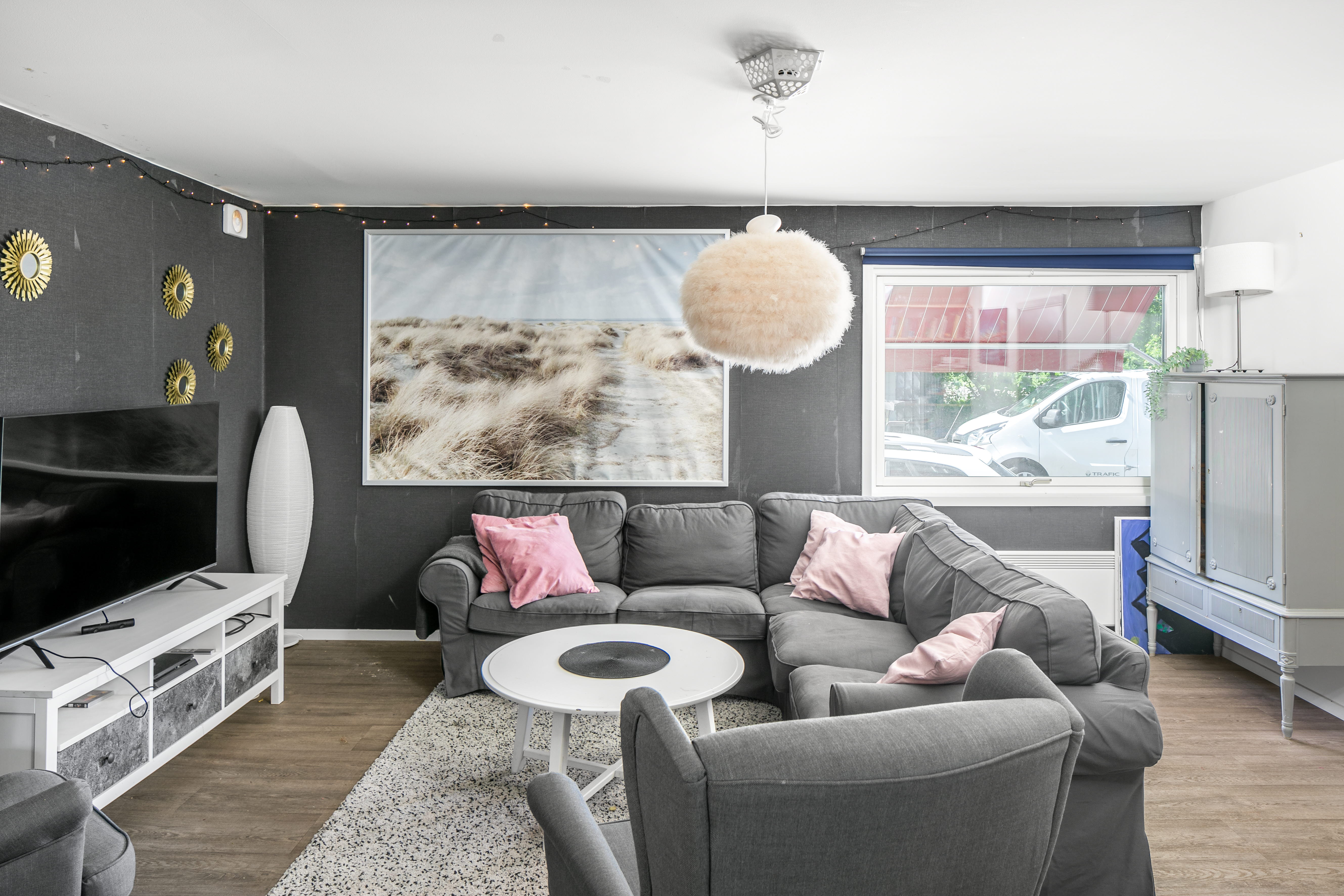 A living room filled with furniture and a fireplace