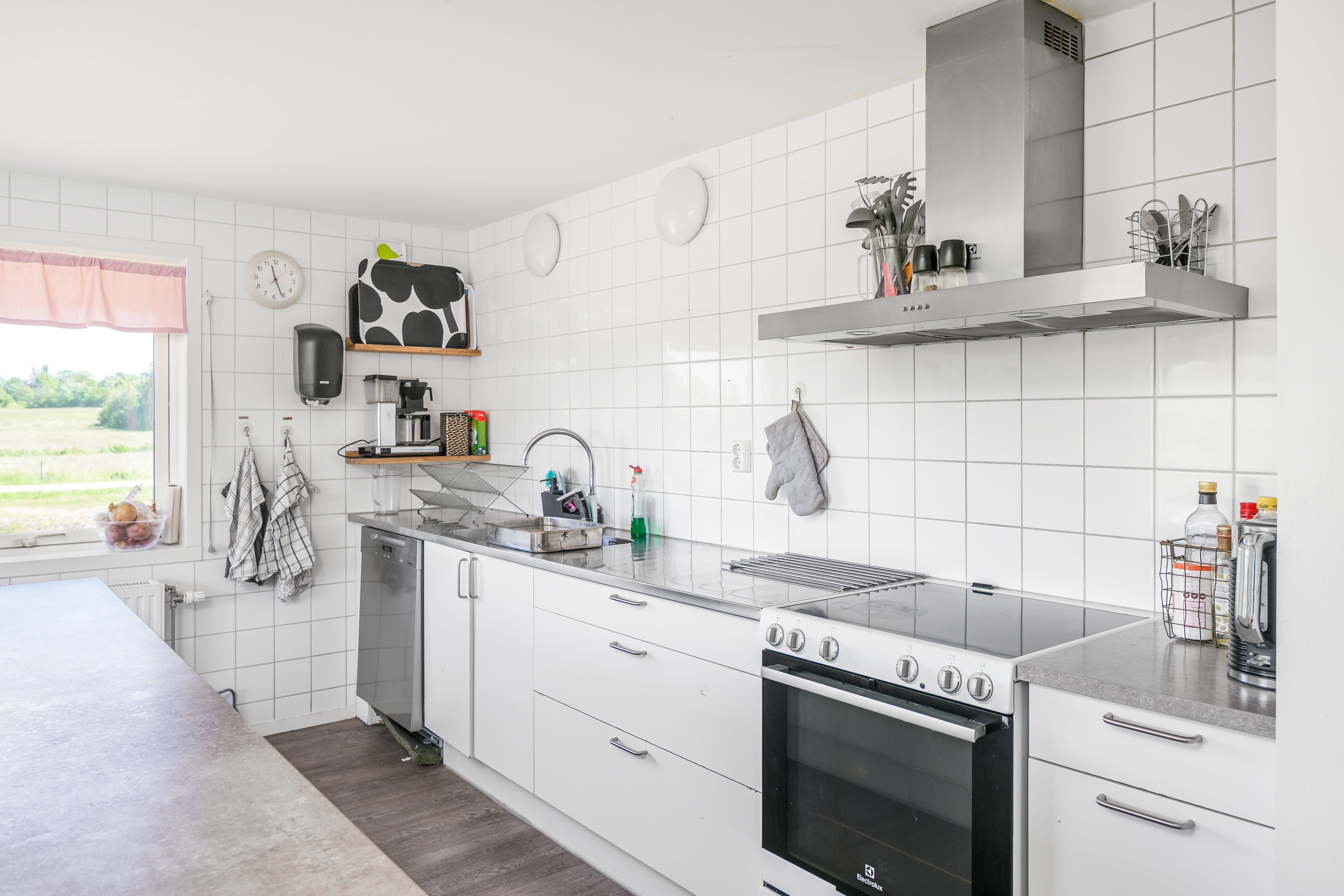 A stove top oven sitting inside of a kitchen