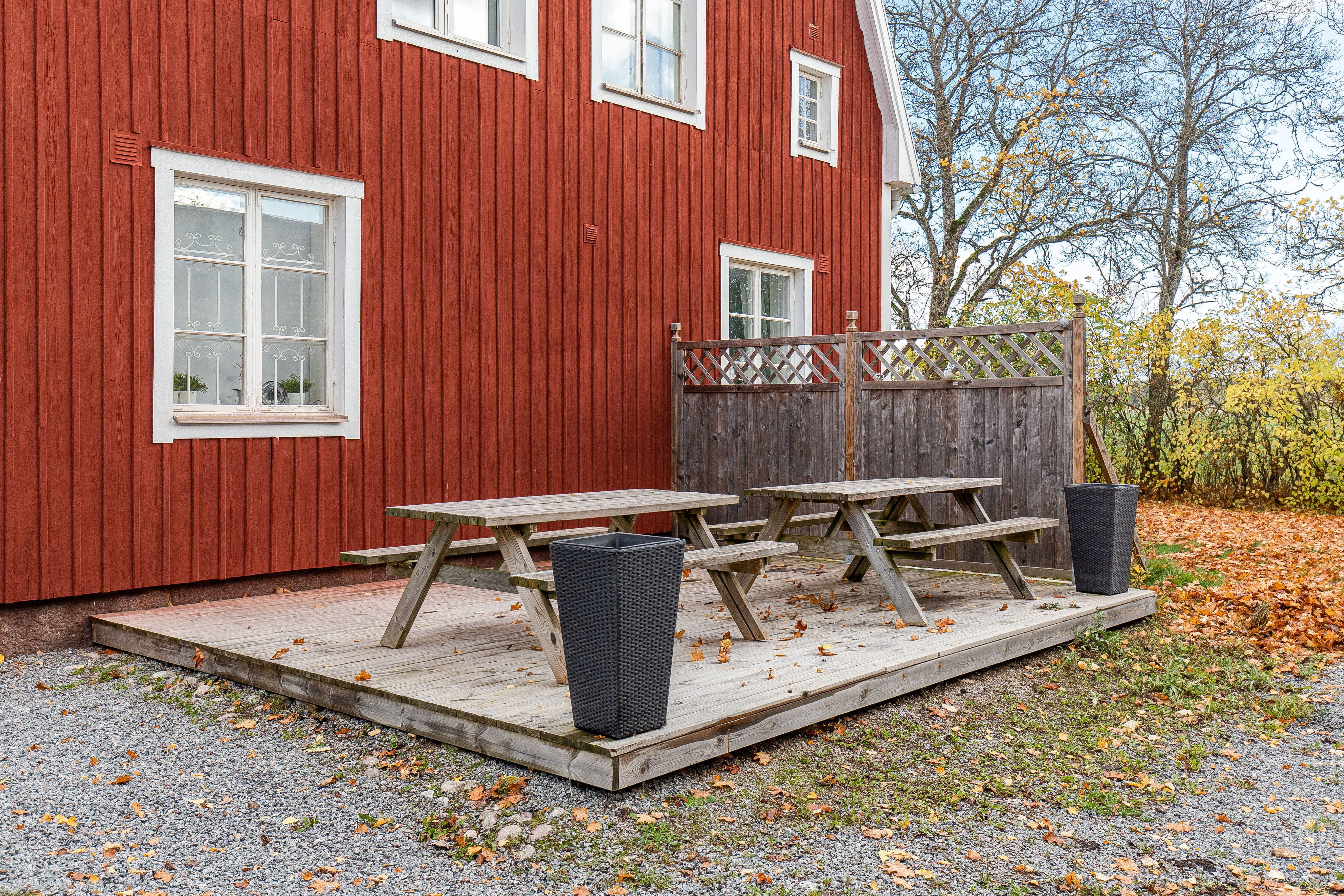 A bench in front of a house