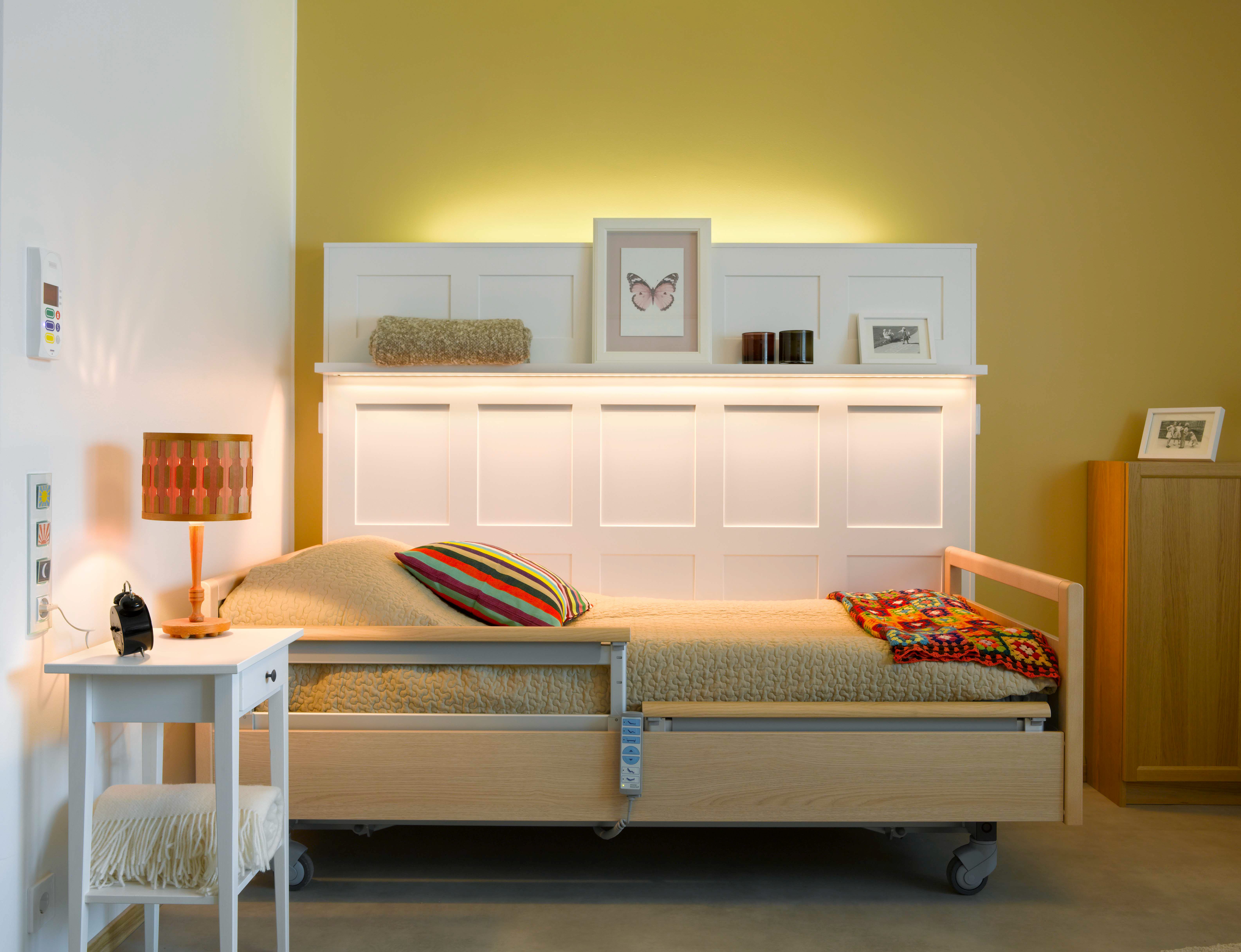 A bedroom with beautiful lighting