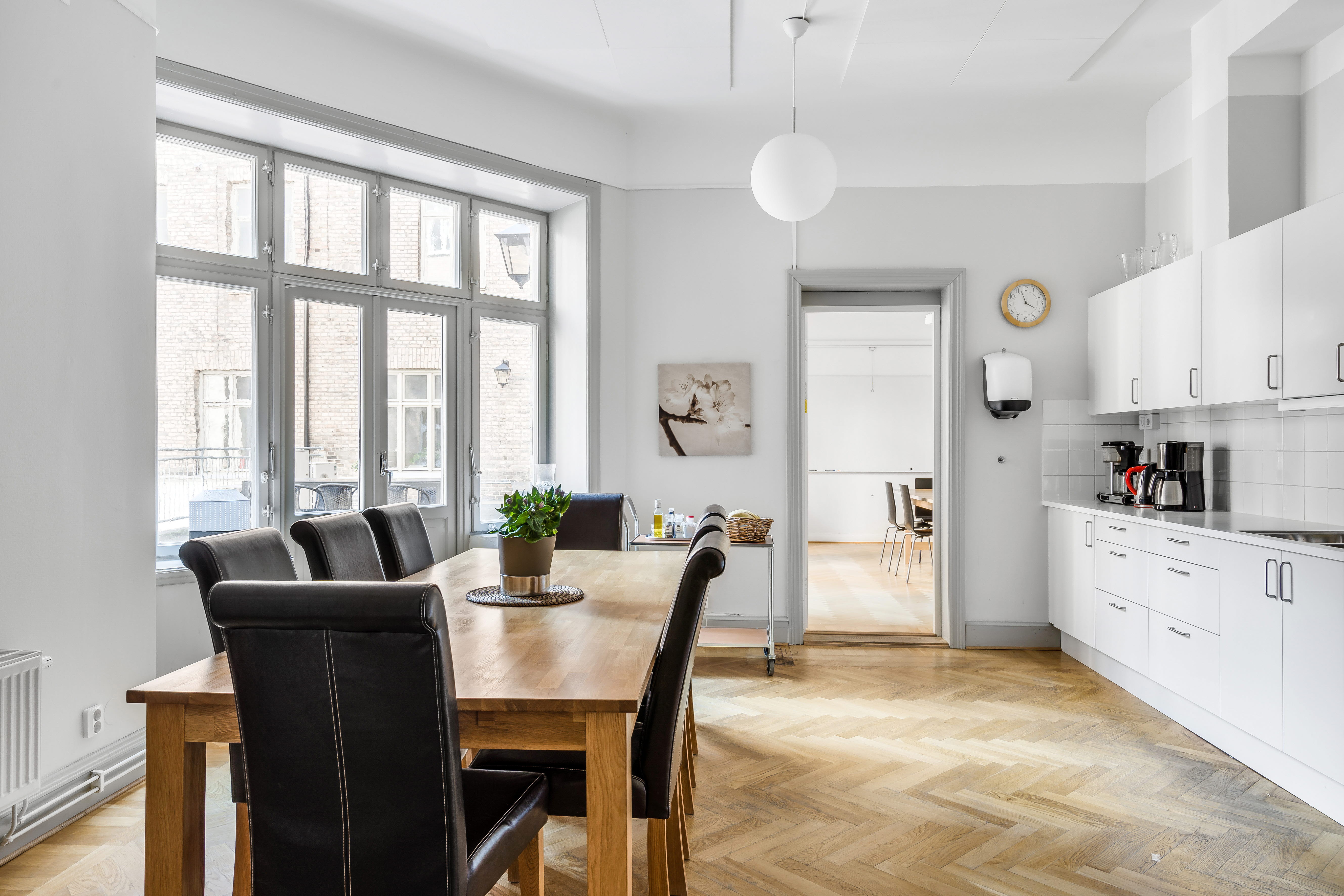 A living room filled with furniture and a large window